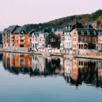 assorted-color of houses near lake