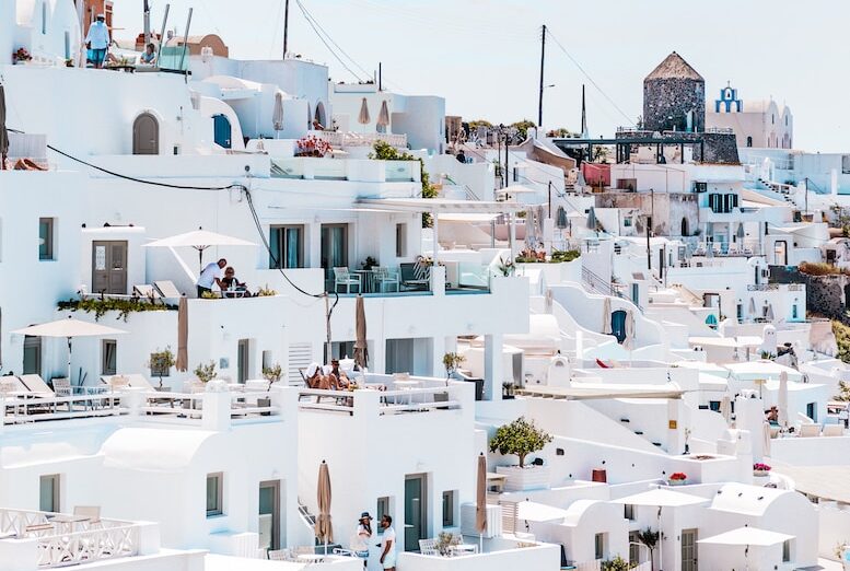 white concrete houses under blue sky at daytime